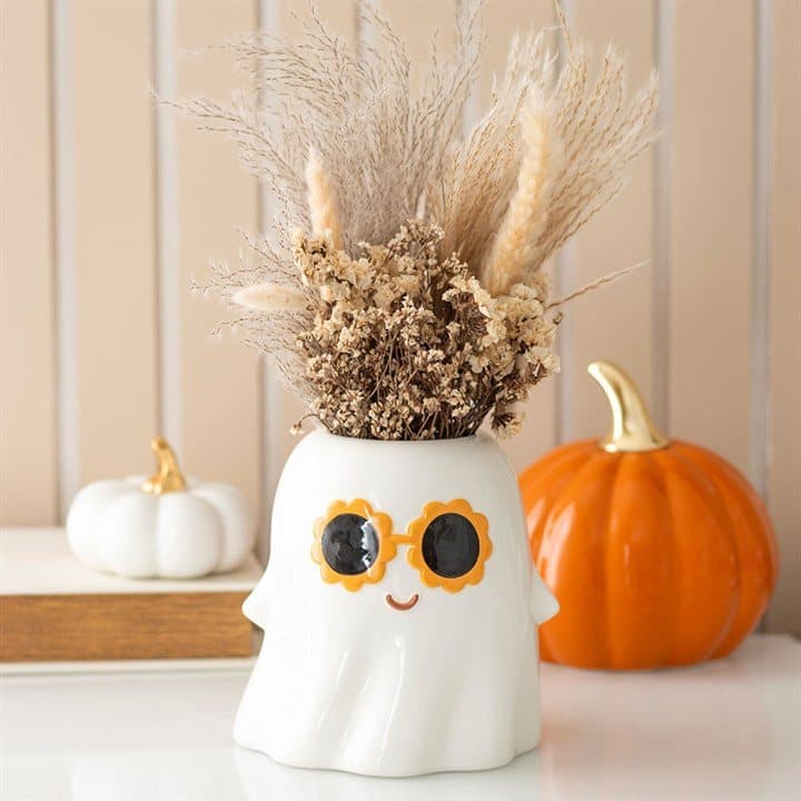 Ceramic ghost-shaped vase wearing 60s style sunglasses