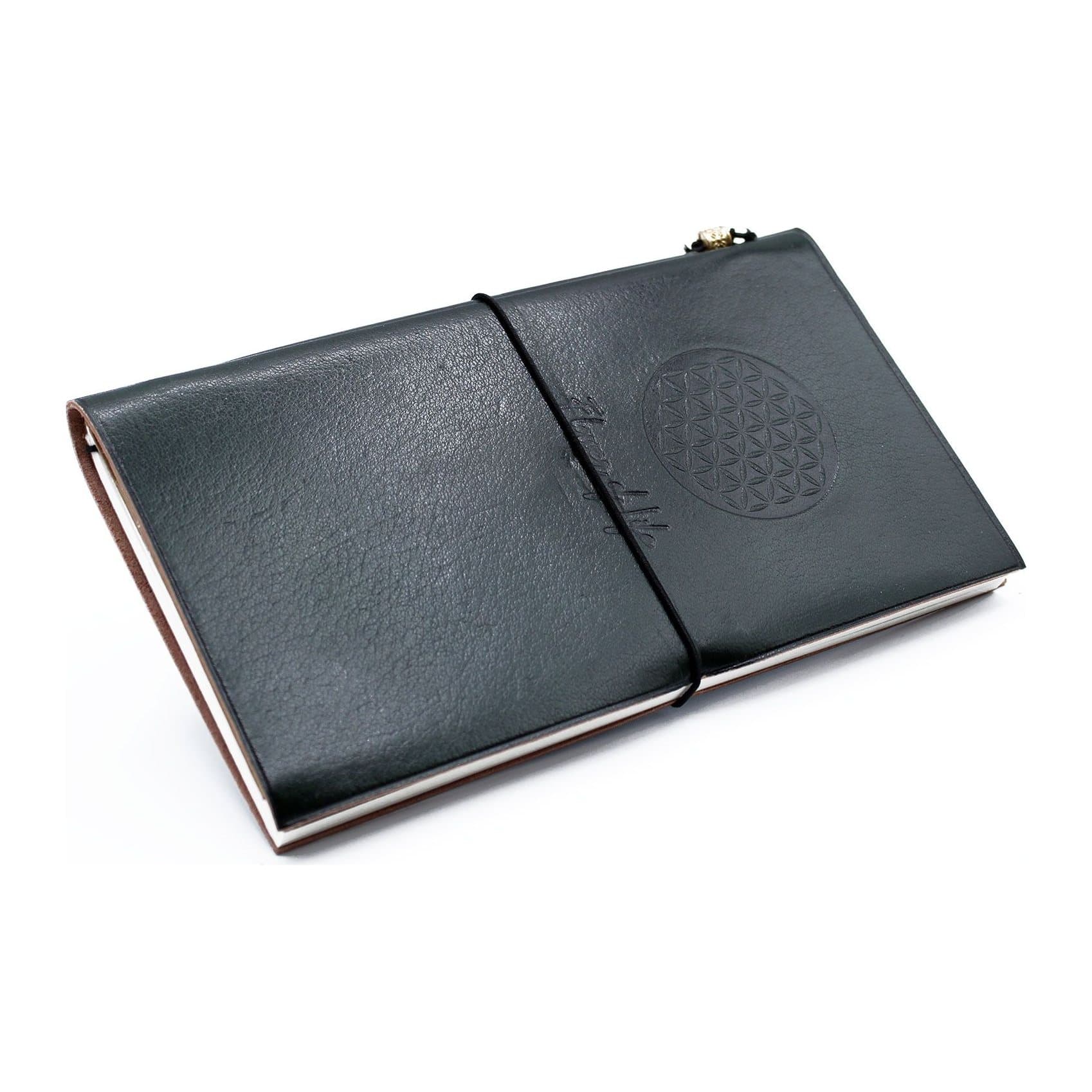 Green handmade leather journal with a Flower of Life design and wrap around band
