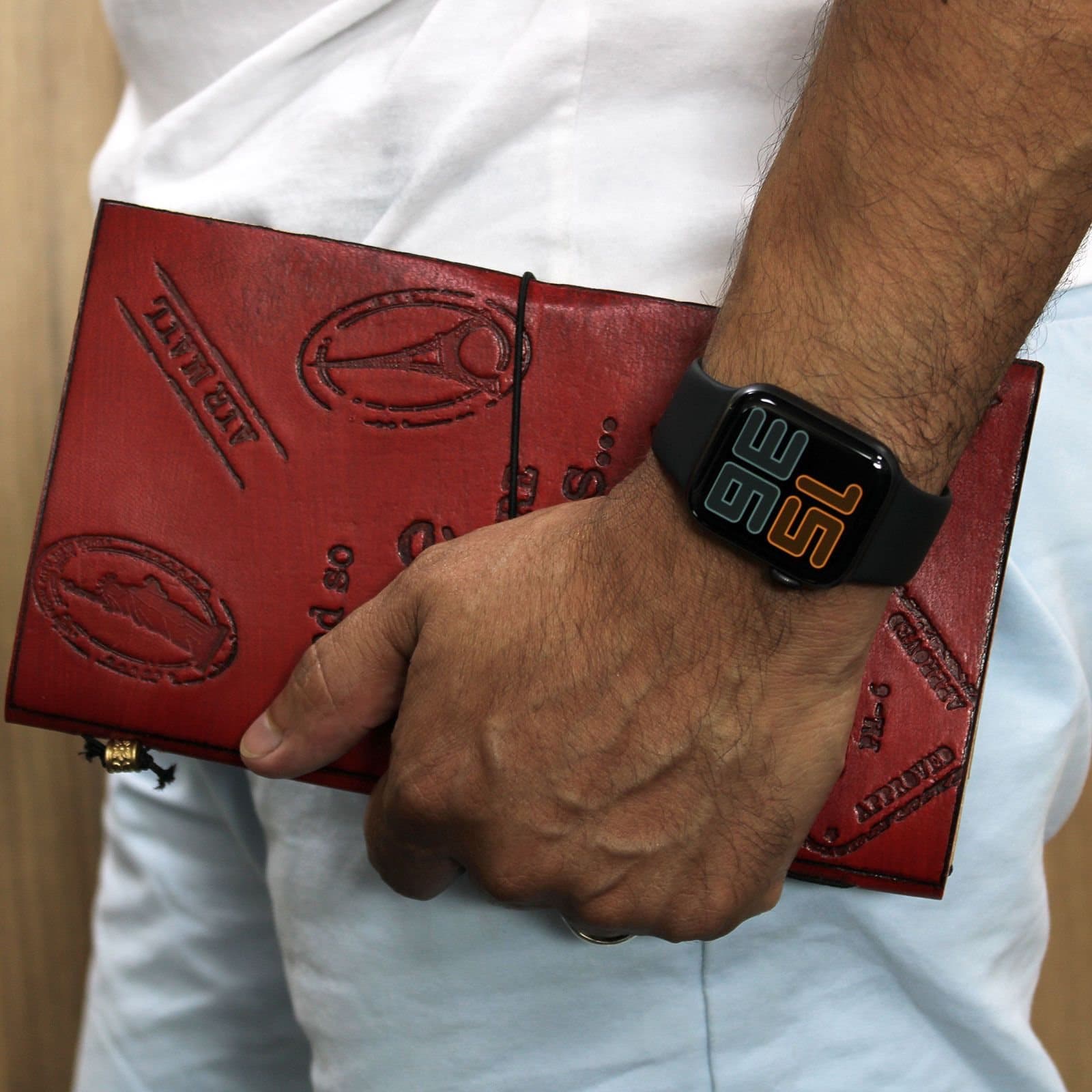 Red leather journal with wrap-around band