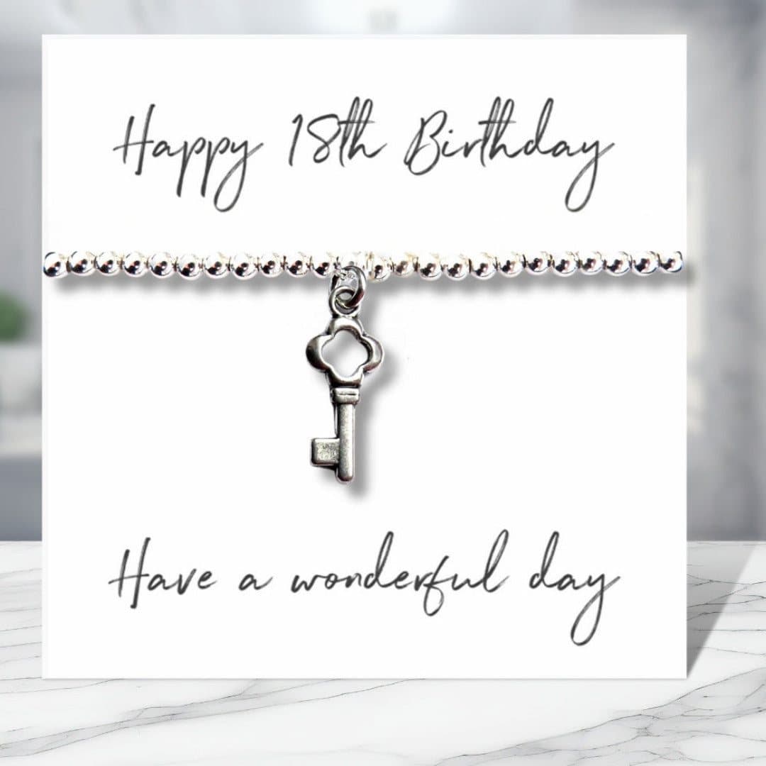 Stretch beaded bracelet with a key charm and a Happy 18th Birthday message card