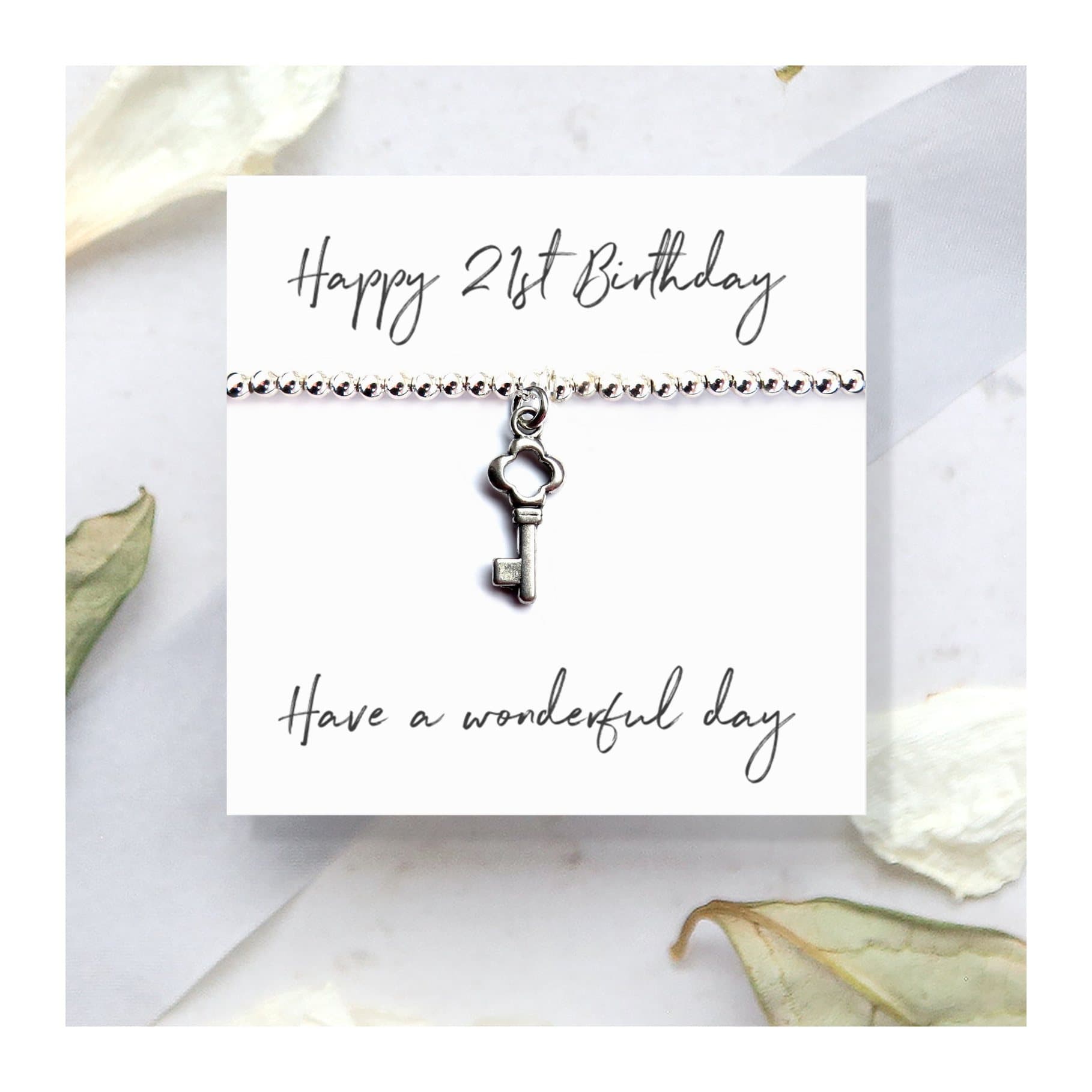 Happy 21st Birthday bracelet with a key charm and message card