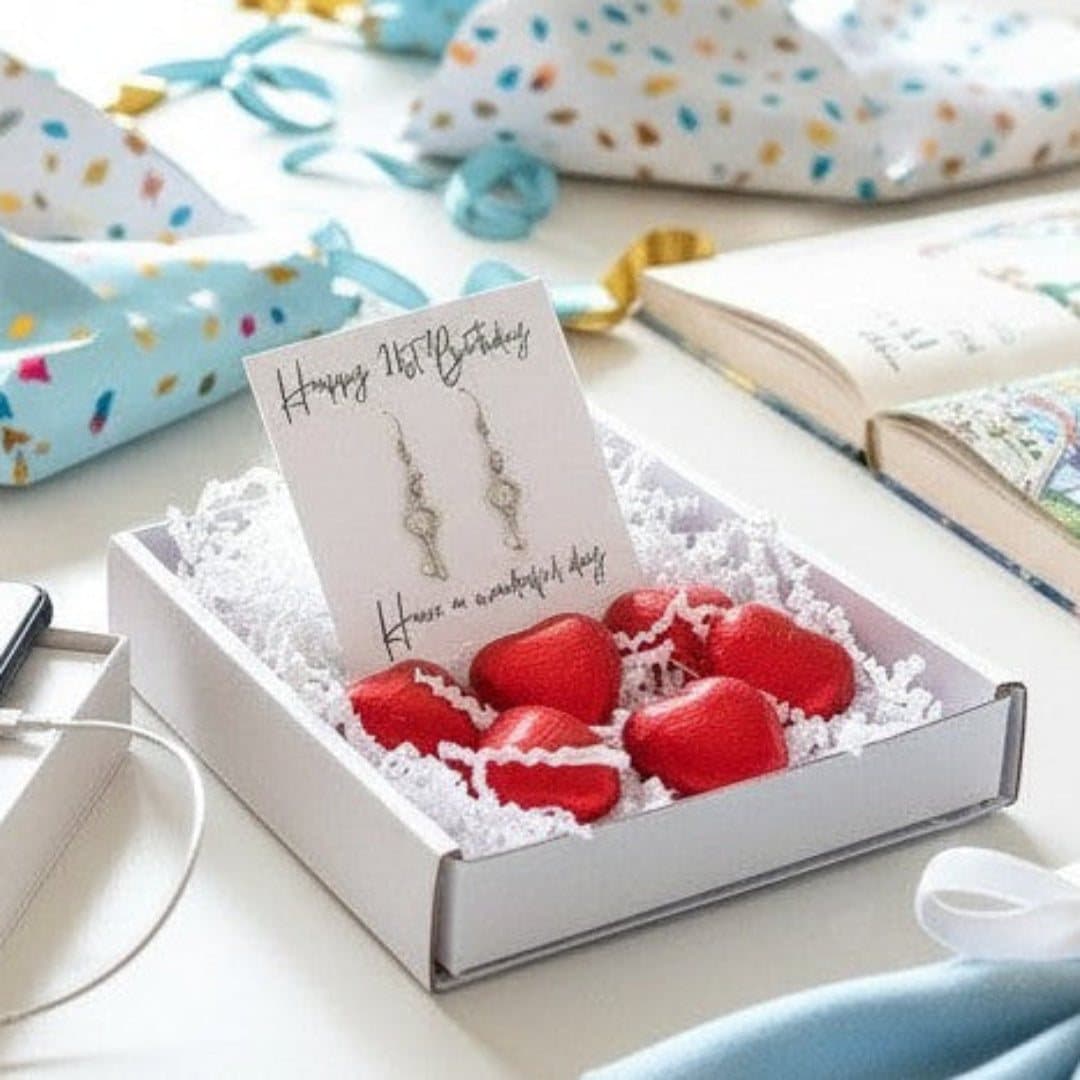 21st birthday gift hamper with drop earrings, key charm and chocolate hearts