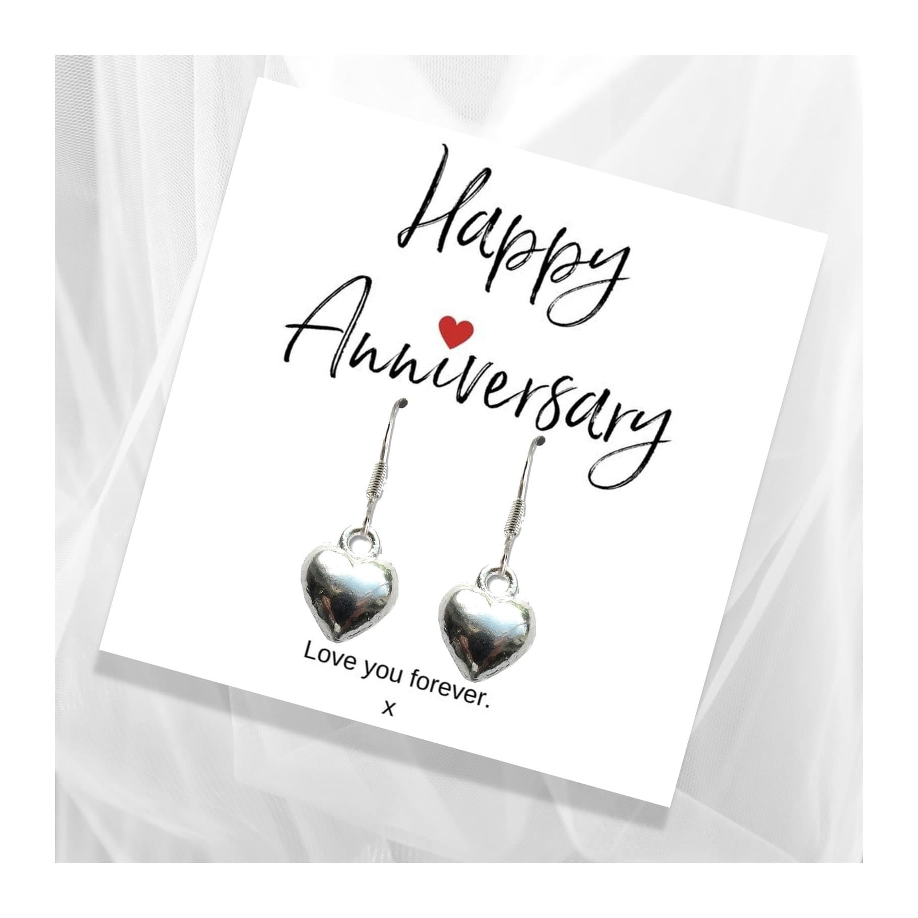 Silver heart charm earrings with a Happy Anniversary message card