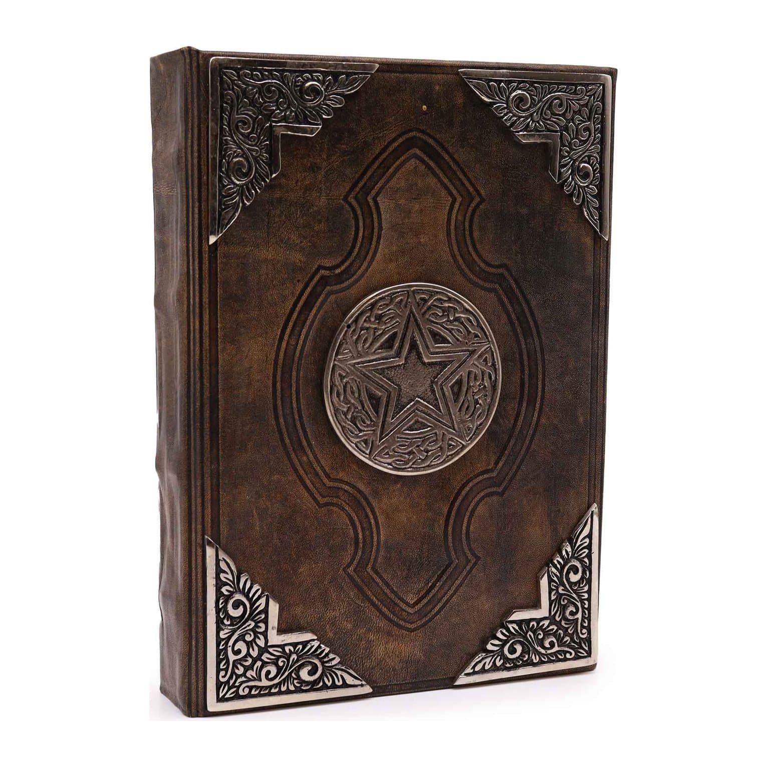 Brown tan leather journal with a zinc pentagon decor on the cover