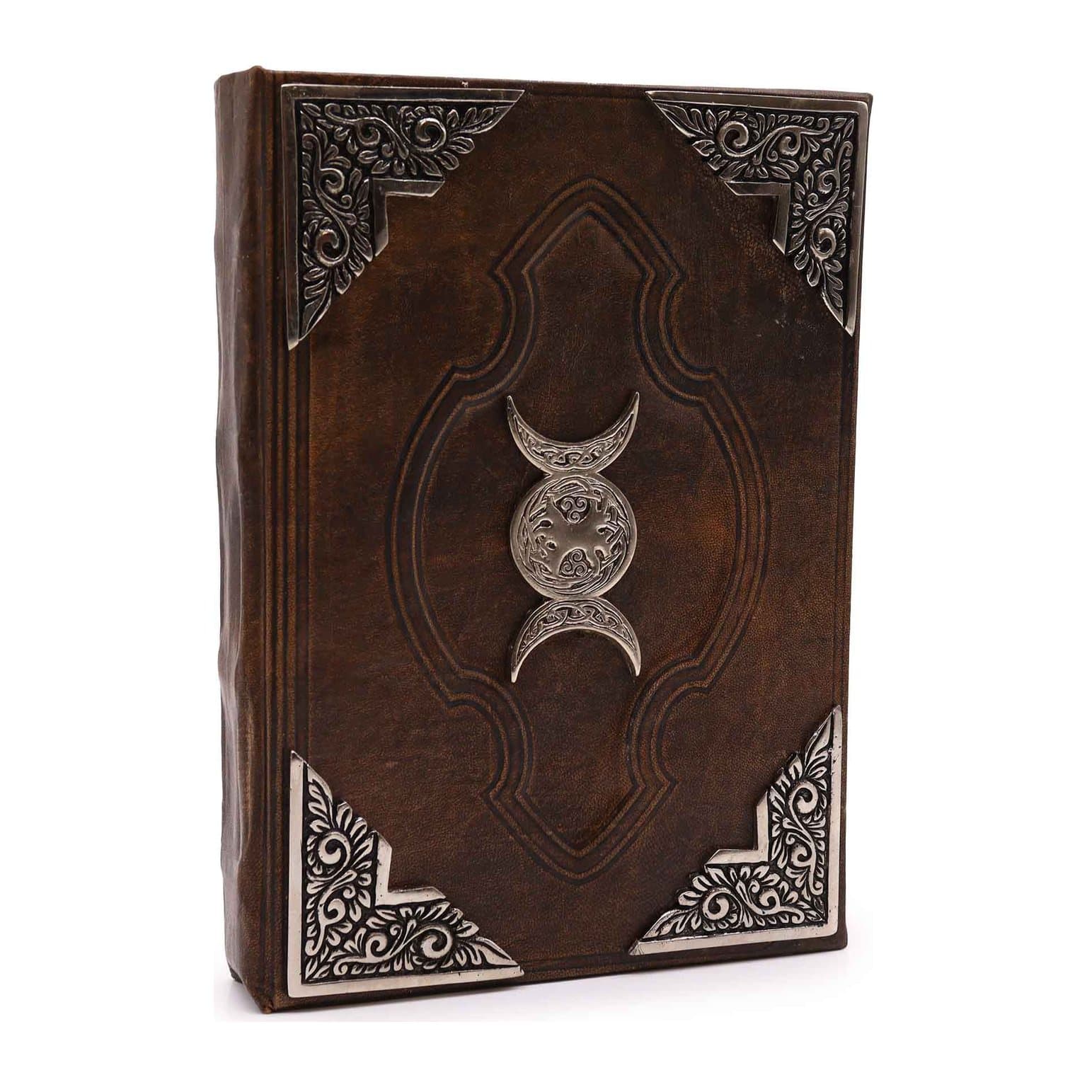 Brown tan leather journal with a zinc triple moon decor on the cover