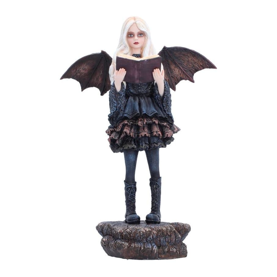 Gothic fairy figurine holding an open book, with long blonde hair and wide wings