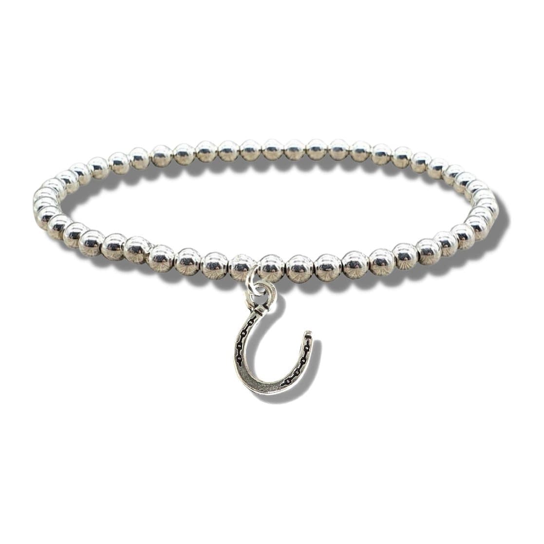 Silver beaded stretch bracelet with a silver horseshoe charm
