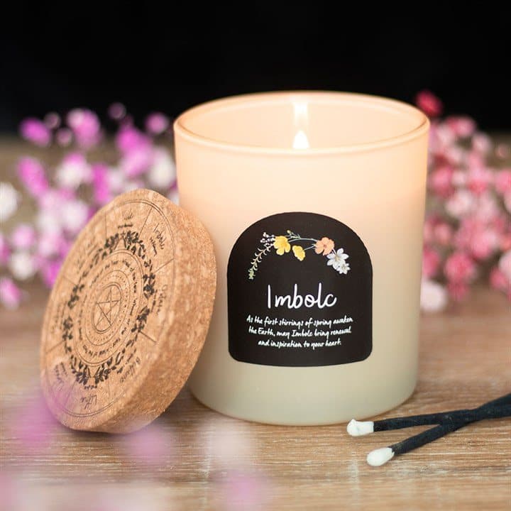 Imbolc spiced vanilla candle in a glass jar with a natural cork lid