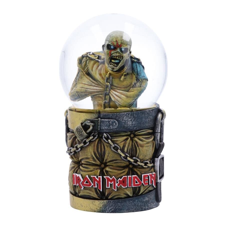 Eddie in a straitjacket and chains inside a glass snow globe