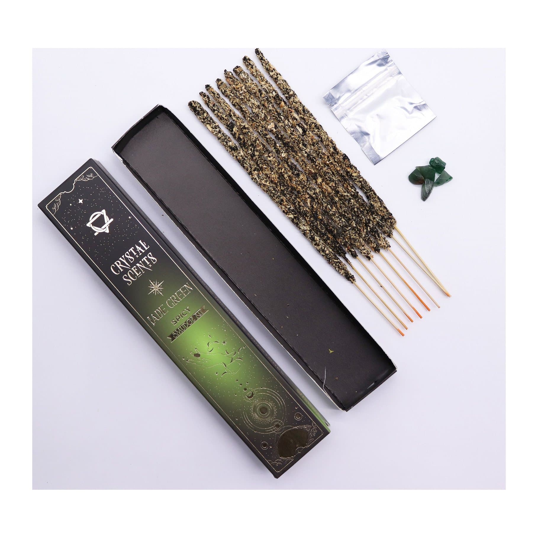 Spicy smudge incense and jade chips in a green celestial-themed cardboard sleeve
