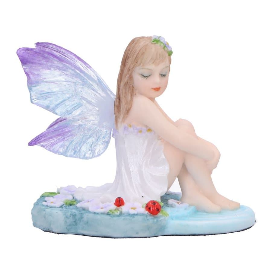 Water nymph fairy figurine by a pool with purple lilies and red ladybugs