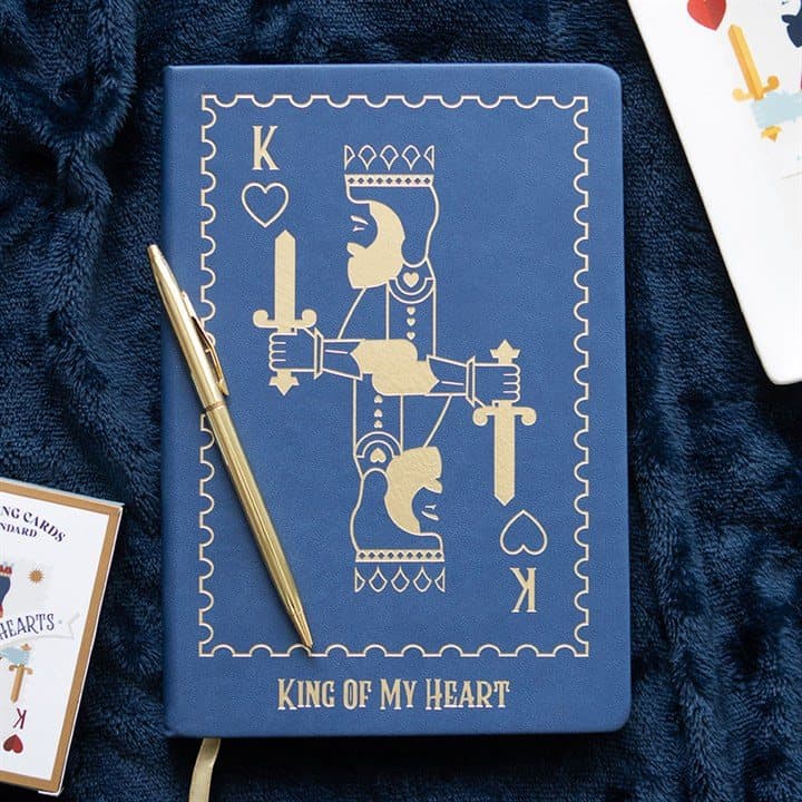 Blue A5 notebook with a gold king playing card design