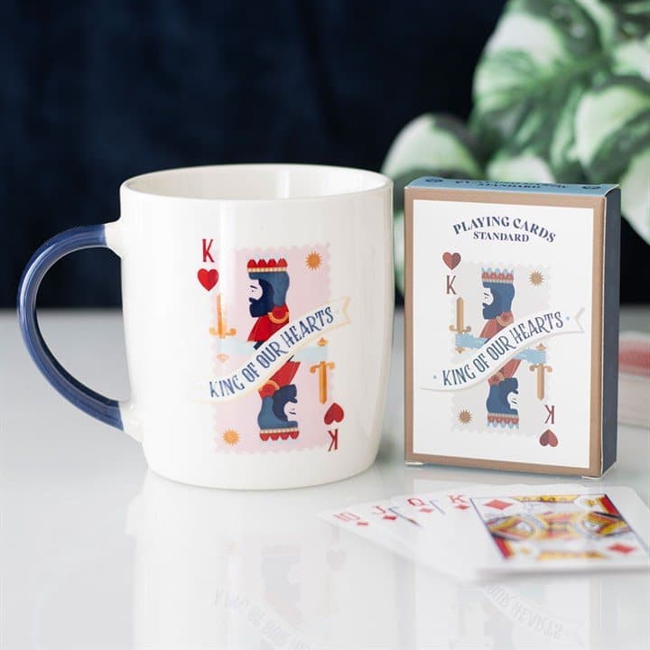 White mug with navy handle and matching king playing cards