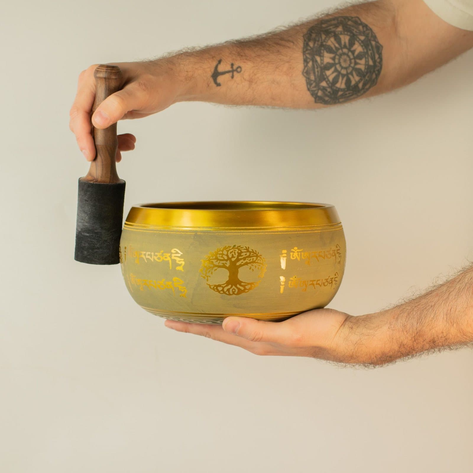 Large copper singing bowl with a Buddha and Tree of Life design