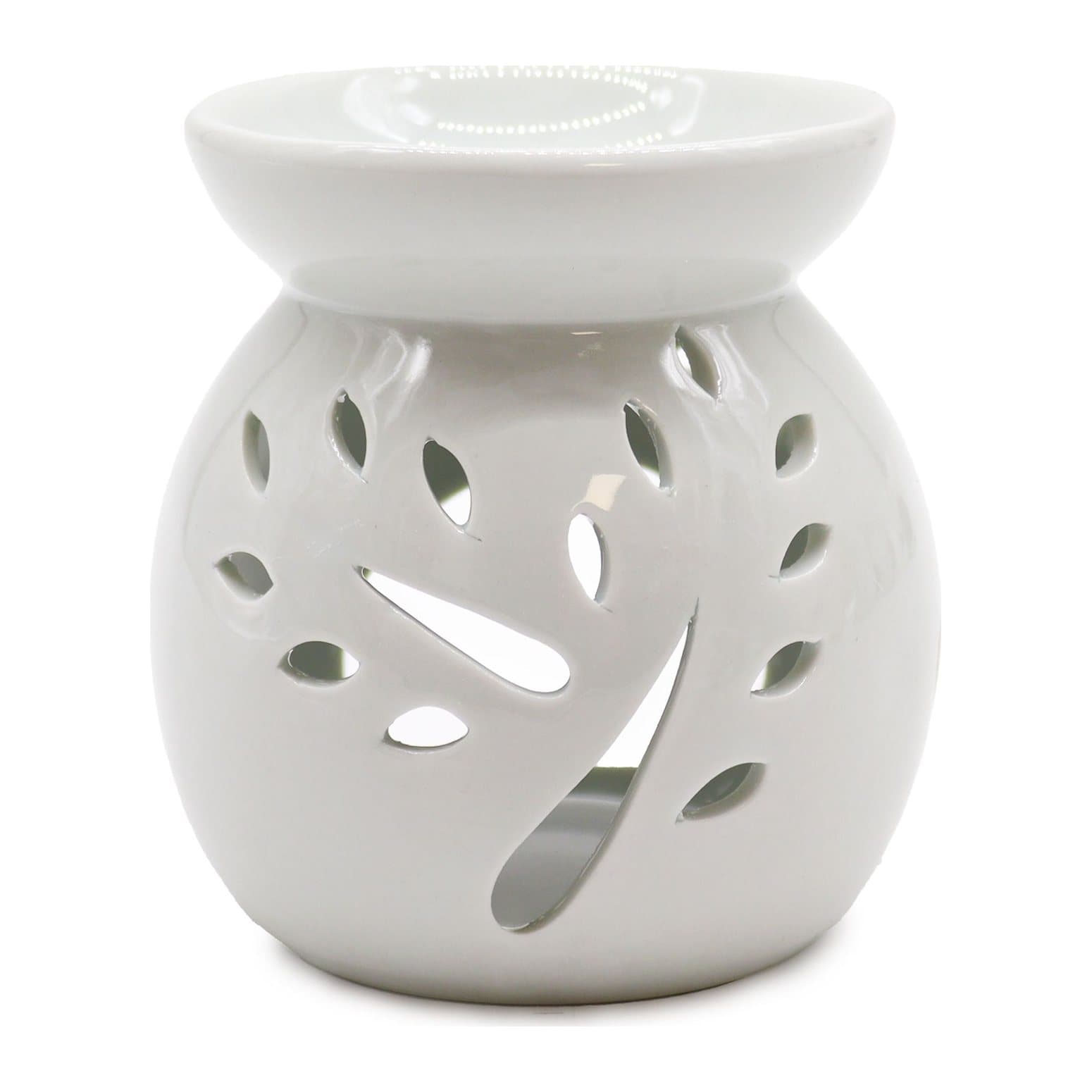 Large white ceramic oil burner with a tree cut-out