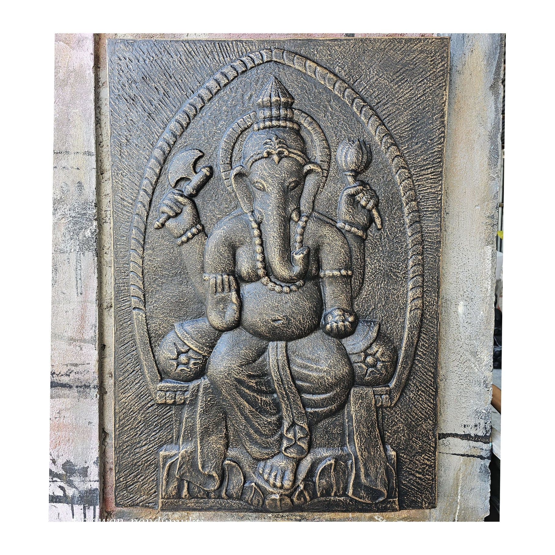 Large Ganpati wall art in an iron frame