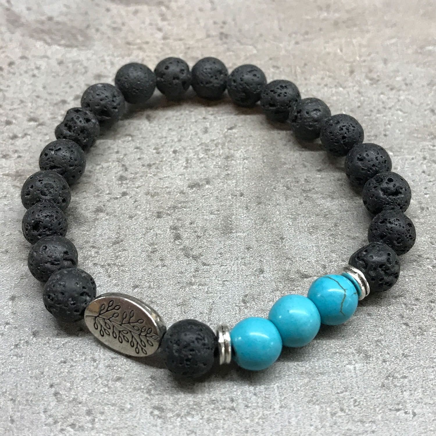 Lava stone bracelet in Leaf Turquoise with dark beads