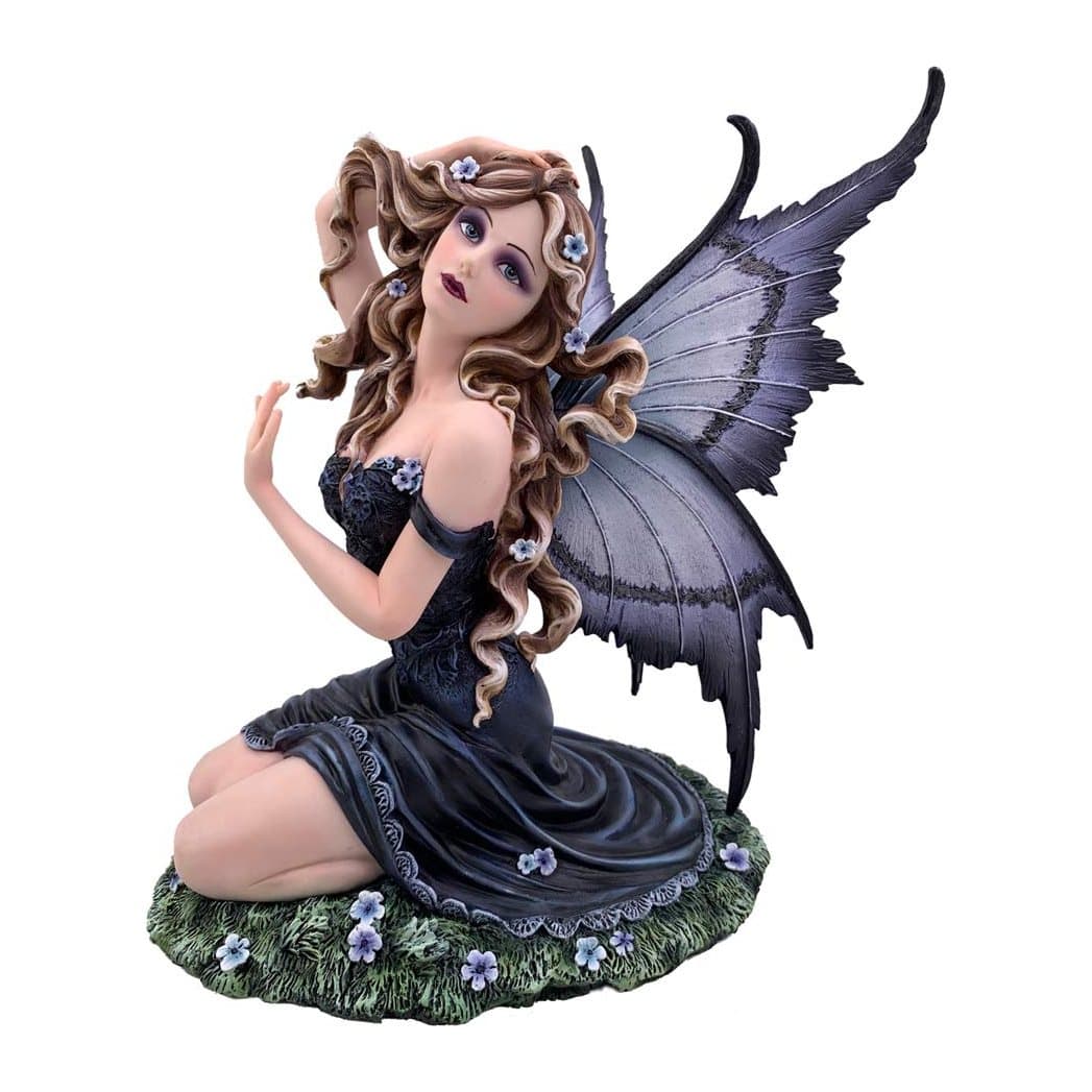 Kneeling resin fairy figurine with lilac butterfly wings and flowers in her hair