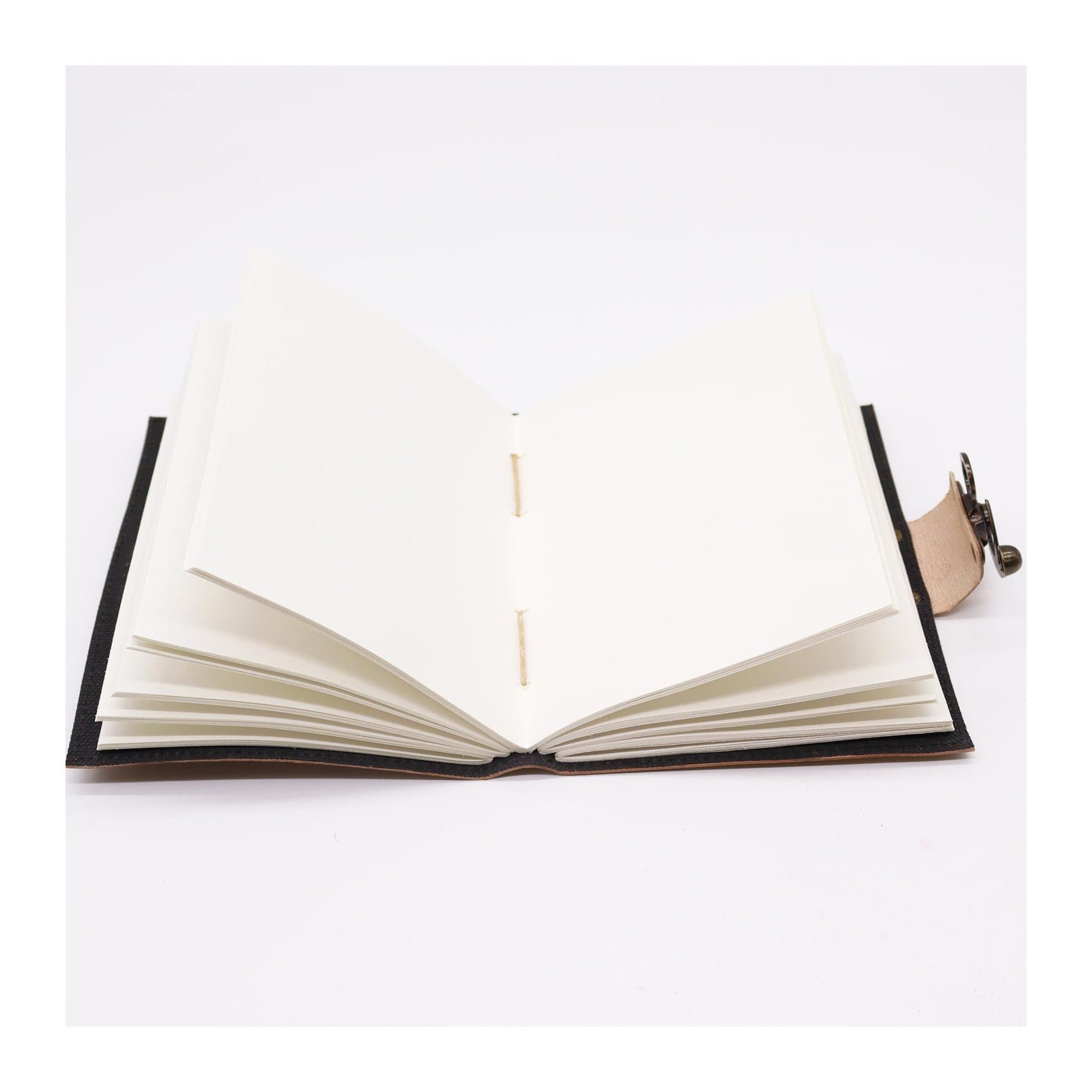 Tan leather journal embossed with birds, stars and Life is Better with Friends