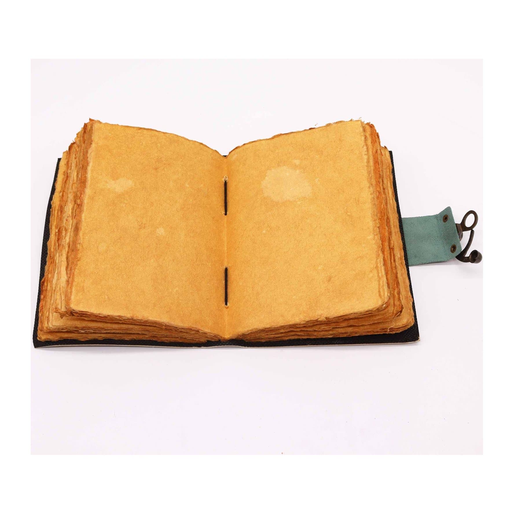 Leather notebook with a moon phase design on the cover and a clasp