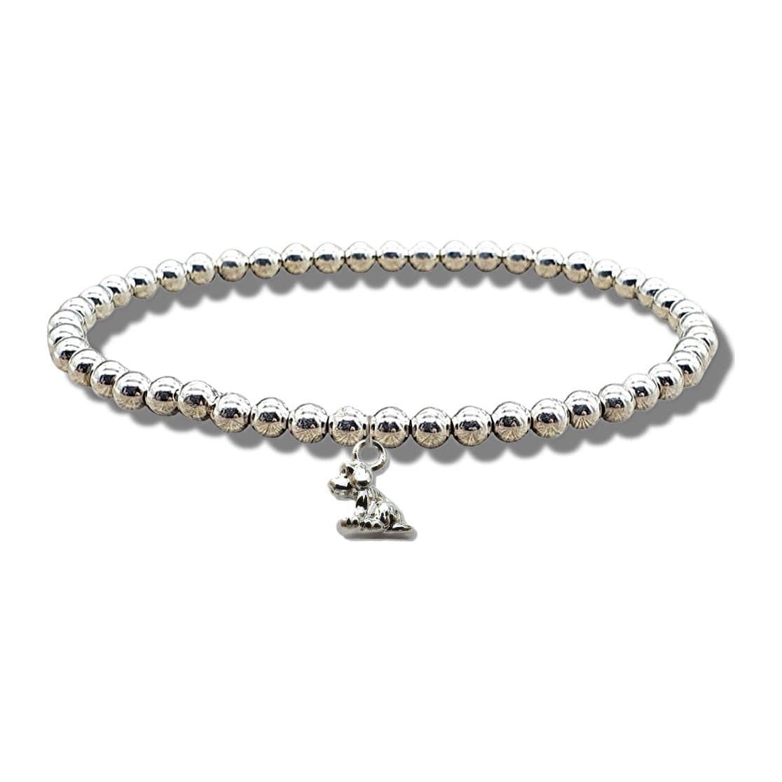 Silver beaded stretch bracelet with a small silver plated dog charm
