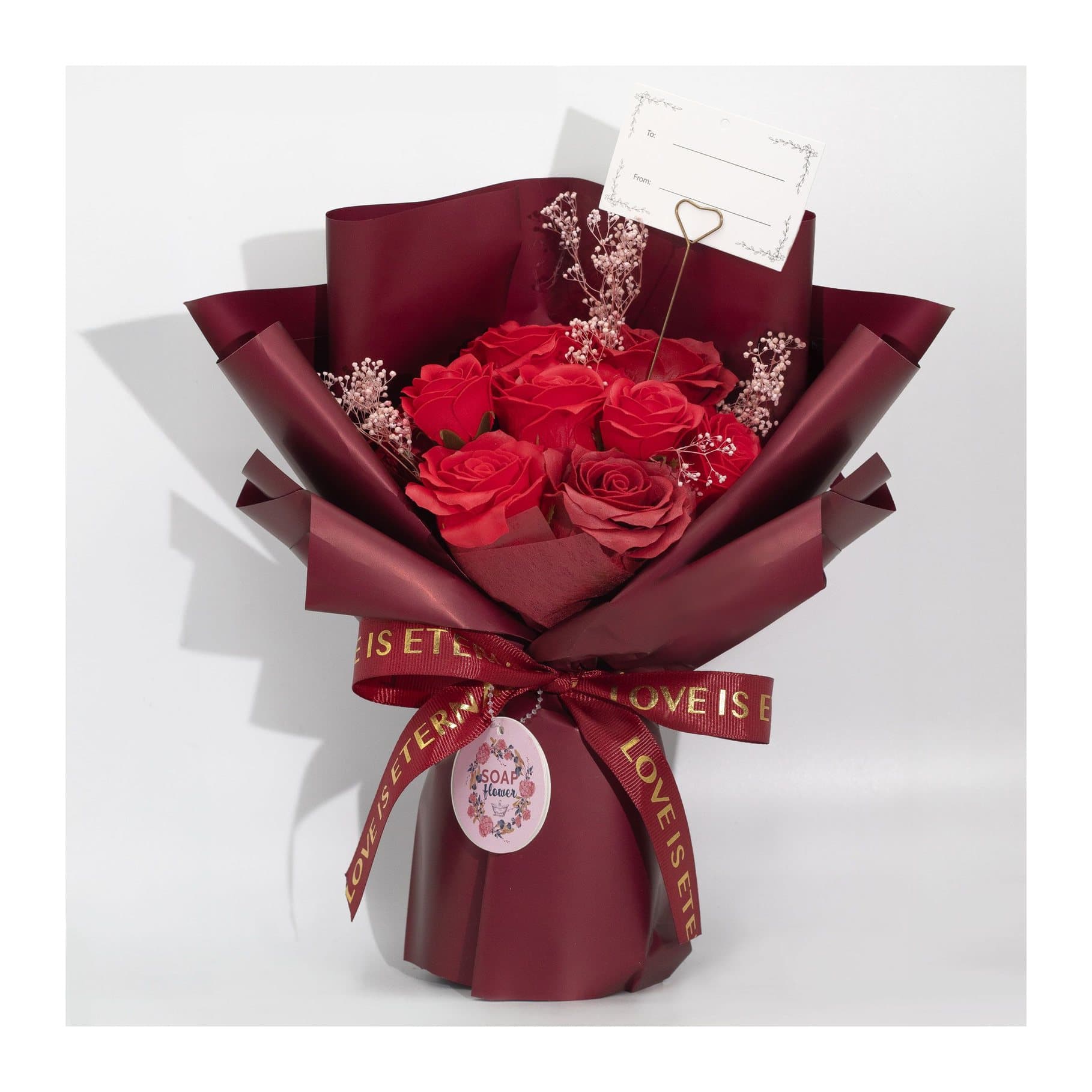 Wrapped bouquet of red soap roses
