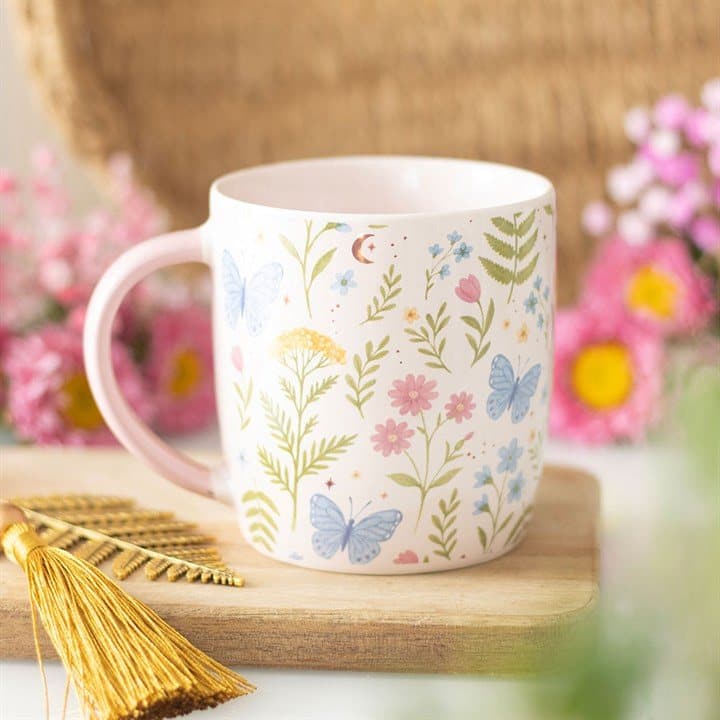 Ceramic mug with a pastel floral print