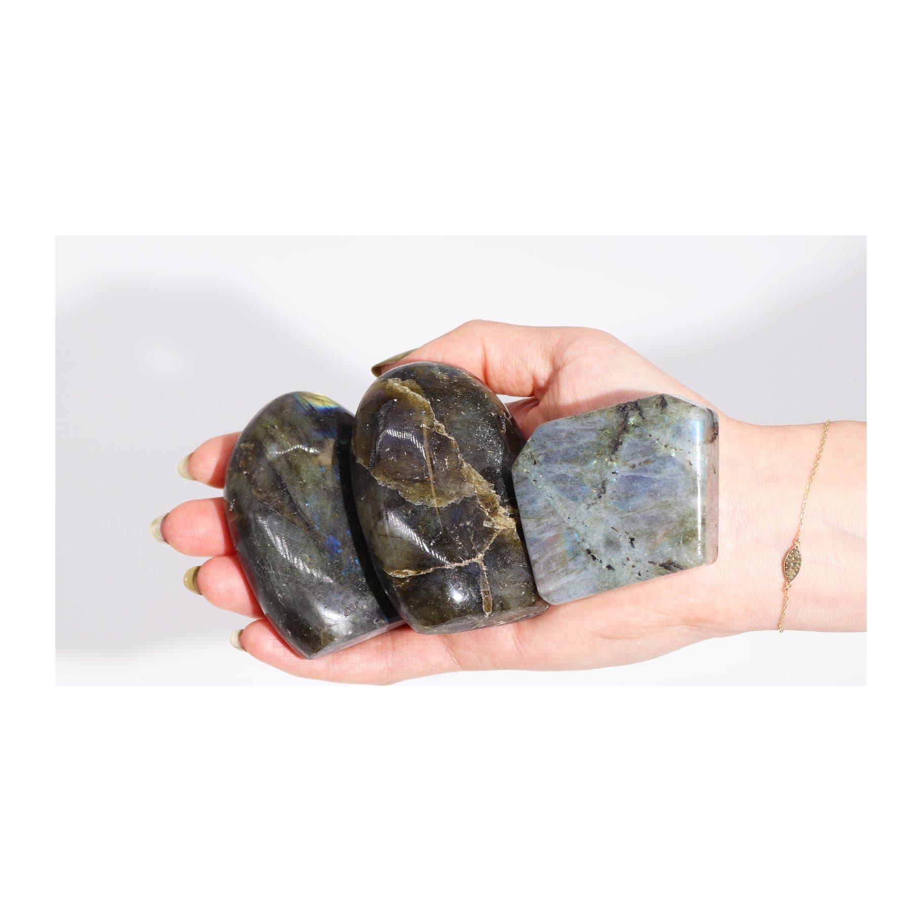 Smooth tumbled labradorite tomb stone with blue, green and gold flashes