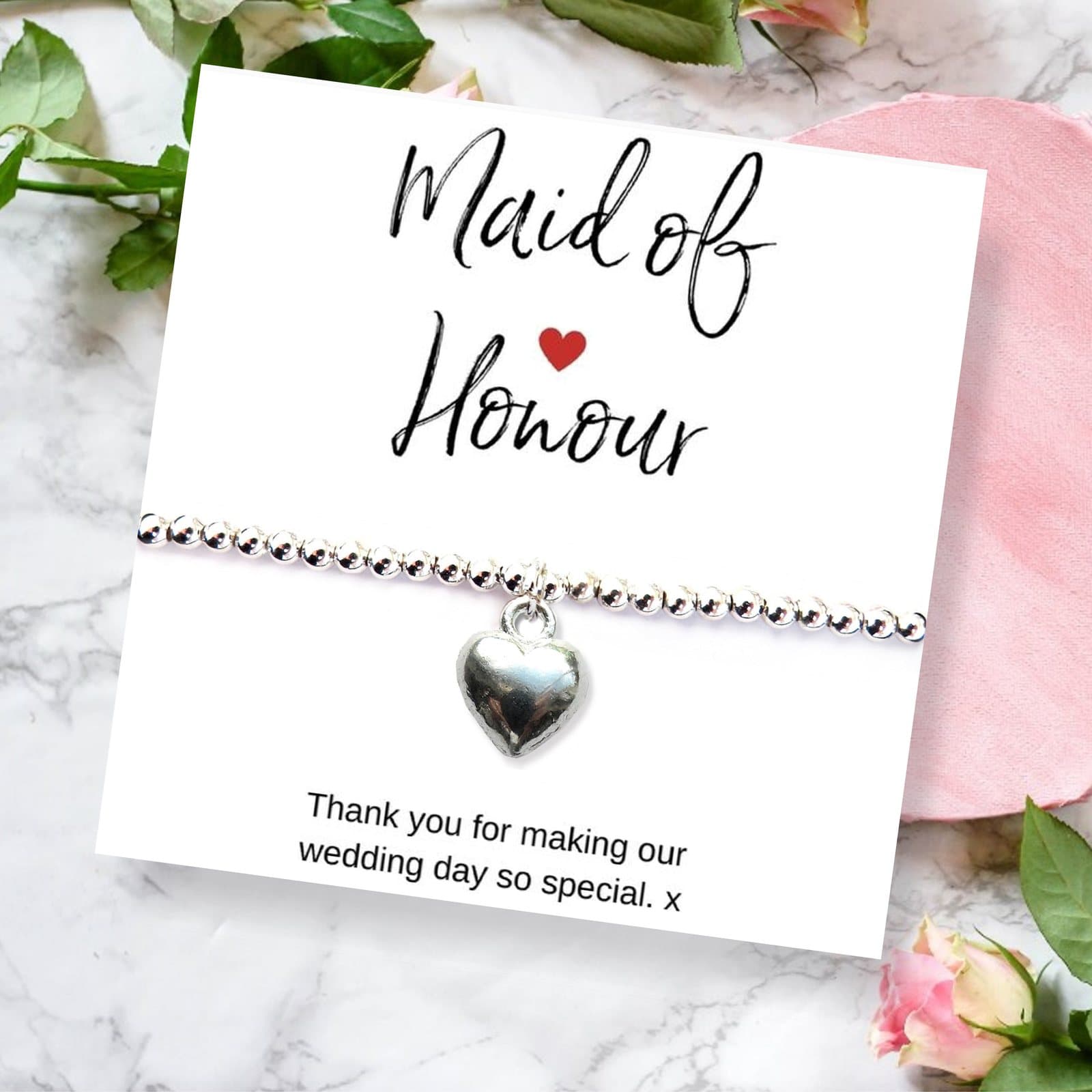 Silver heart charm stretch bracelet with a thank you card for a maid of honour