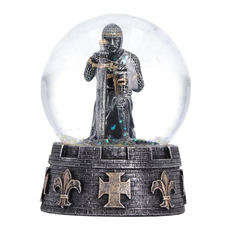 Set of four medieval snow globes, each with a kneeling knight and sword