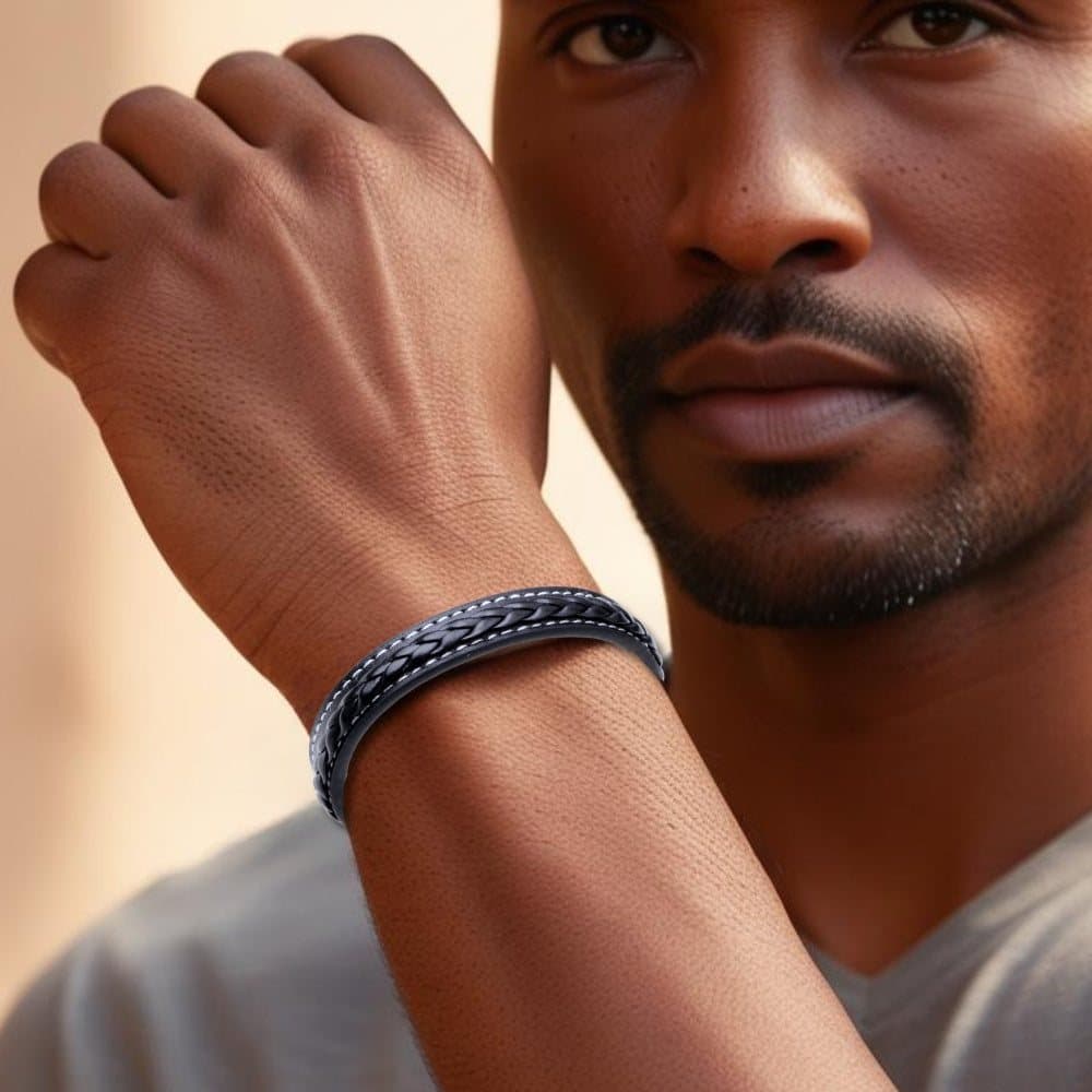 Men's stitched black leather bracelet with a silver magnetic steel fastening