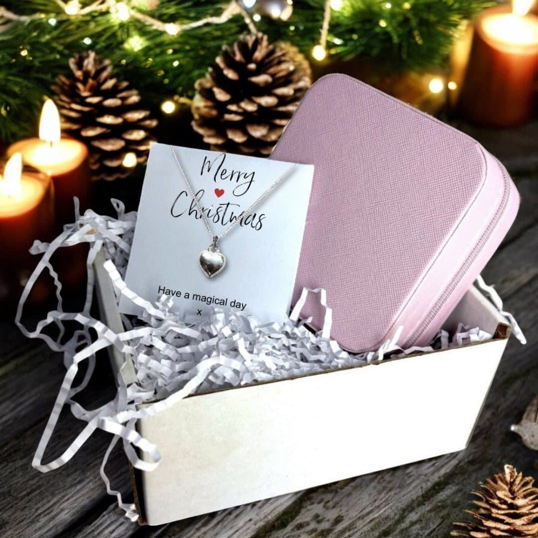 Silver heart necklace, pink jewellery box and Merry Christmas message card