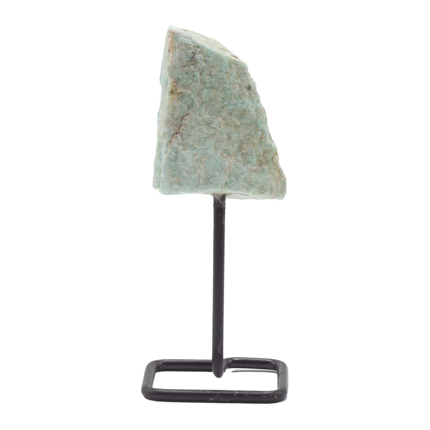 Amazonite mineral specimen with pale green-blue tones on a black metal stand
