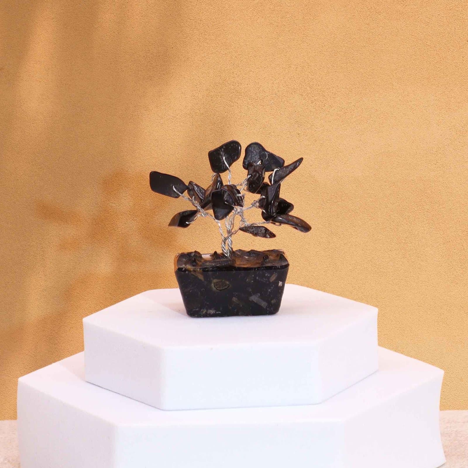 Mini gemstone tree with black agate stones on an orgonite base