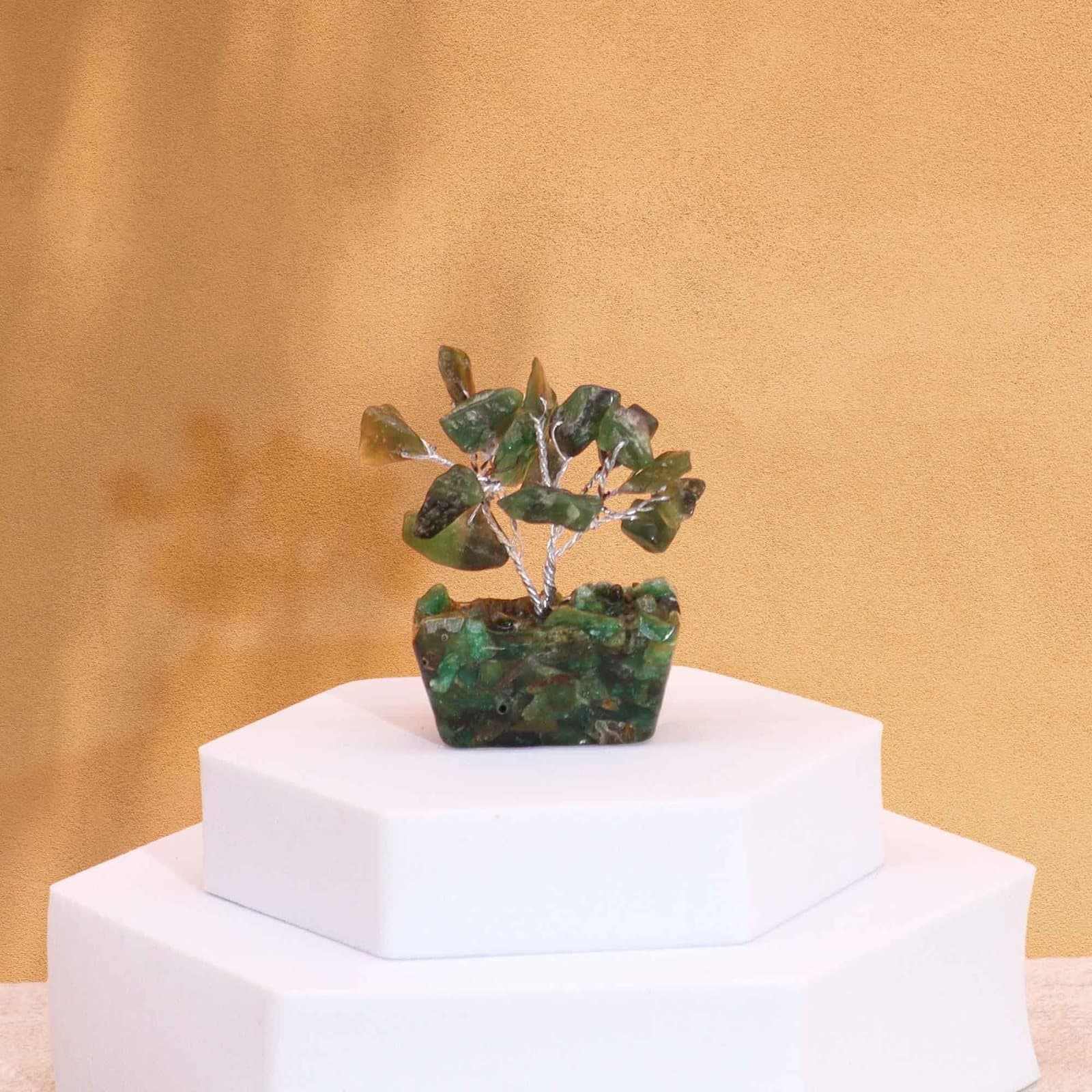 Mini gemstone tree on an orgonite base, set with green aventurine gemstones