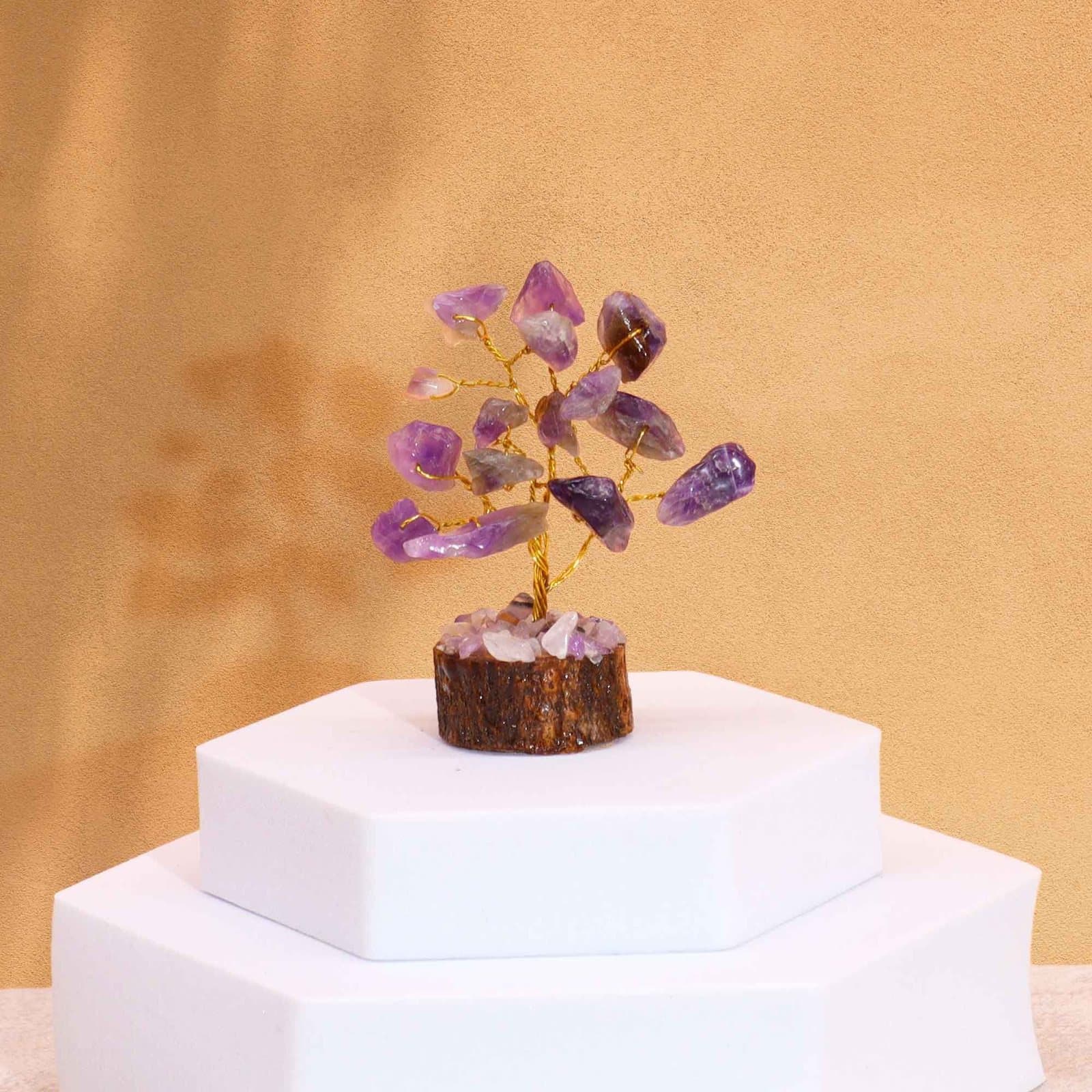 Mini gemstone tree on a wood base with amethyst stones