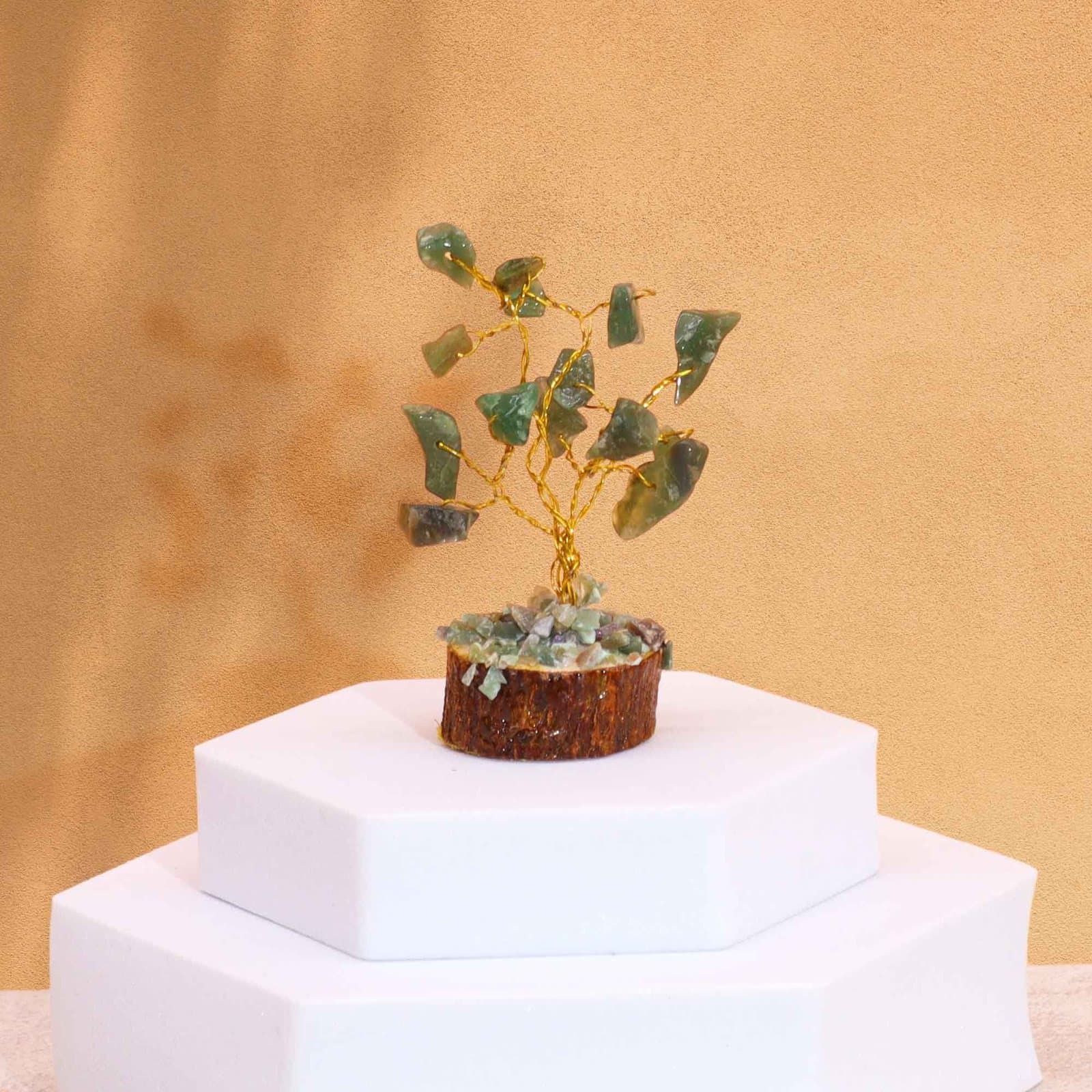 Mini gemstone tree on a wood base with green aventurine stones