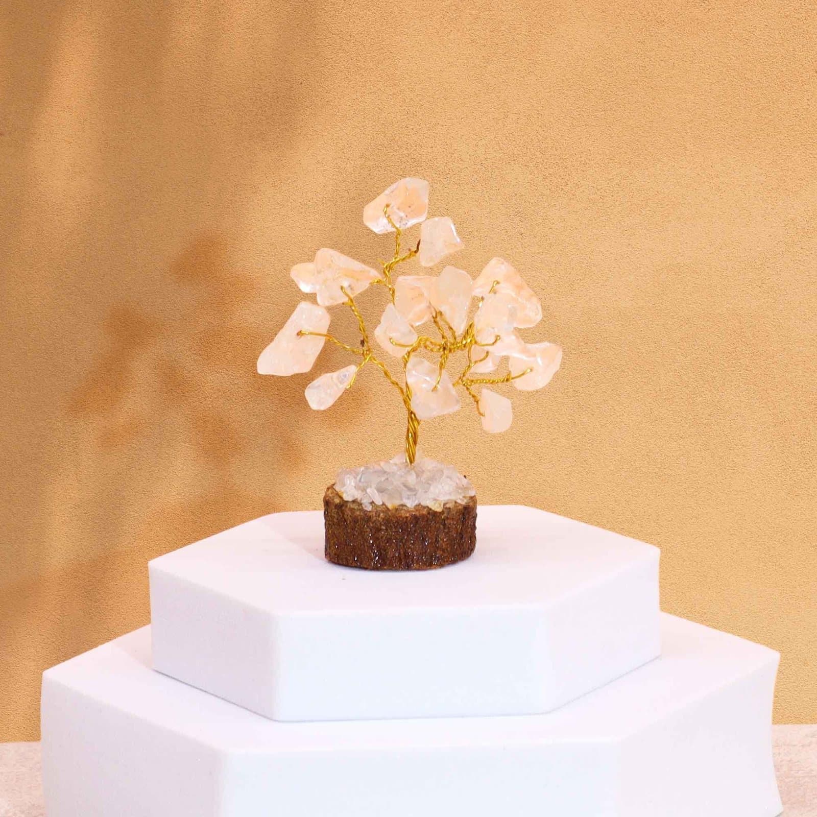 Mini gemstone tree with rock quartz stones on a wood base