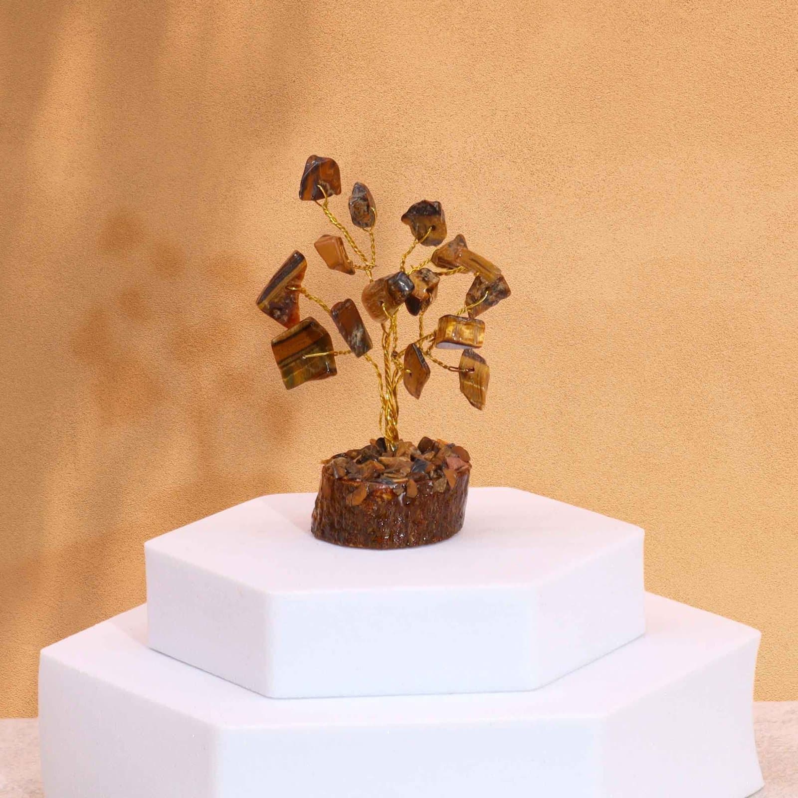 Mini gemstone tree on a wood base with tiger eye gemstones