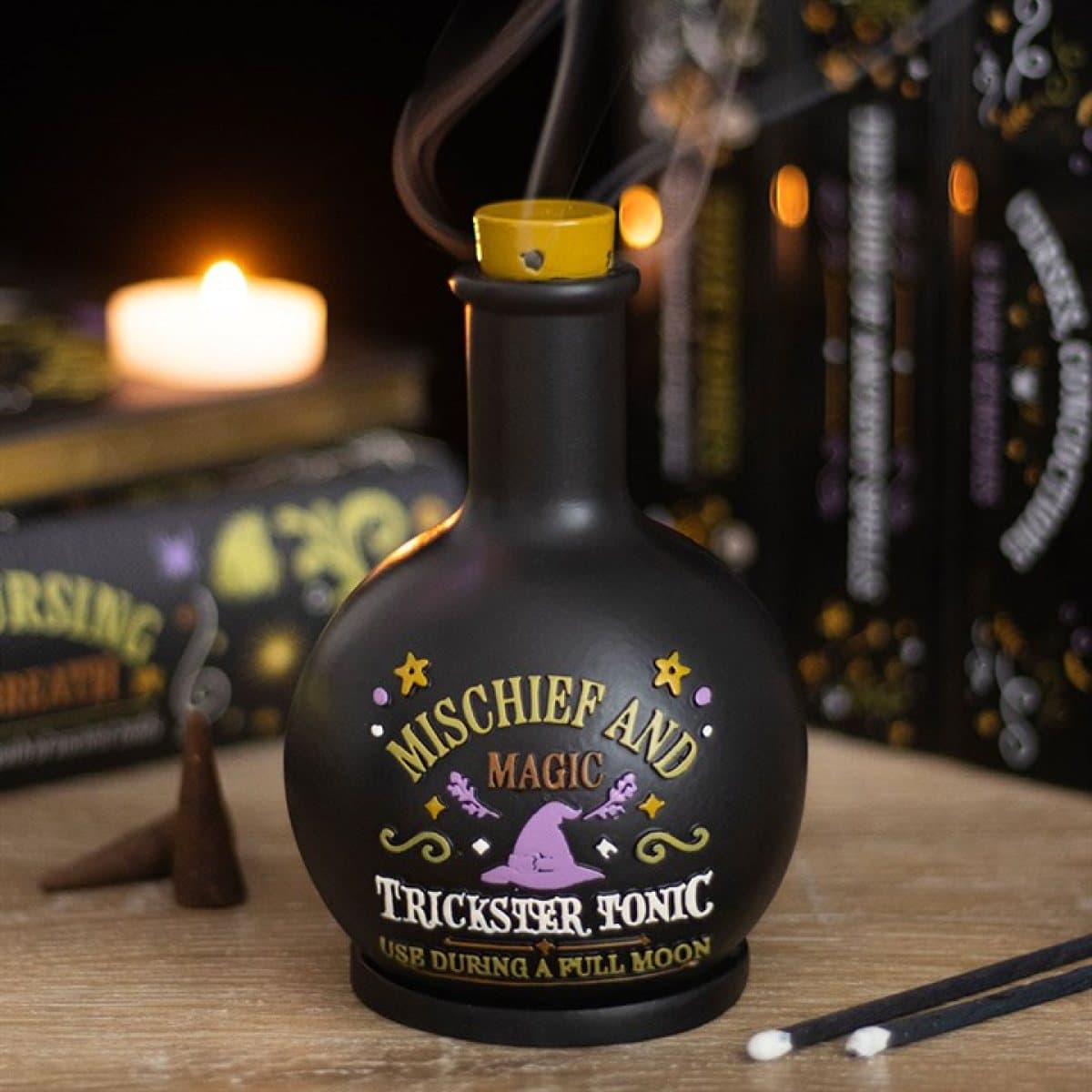 Potion bottle incense cone holder with Mischief and Magic wording
