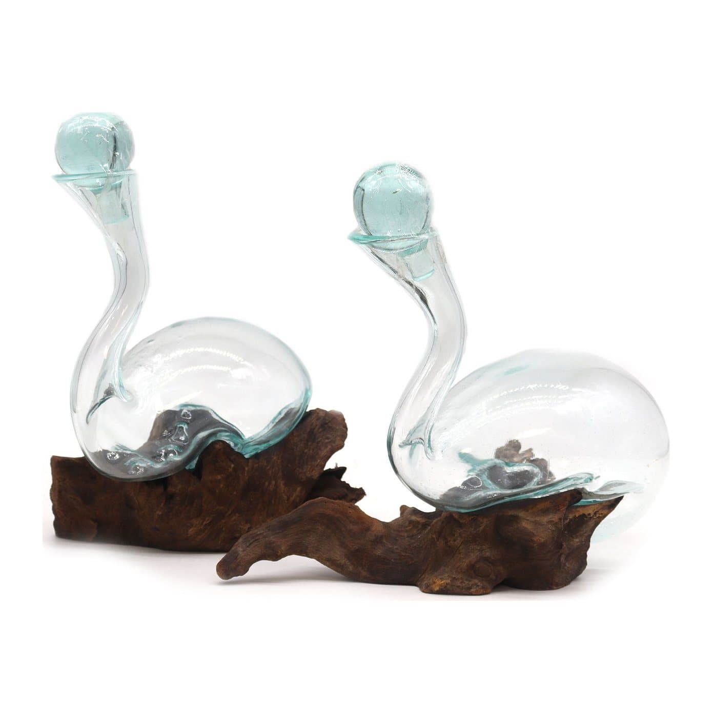 Molten glass wine decanter shaped over a piece of Gamal wood