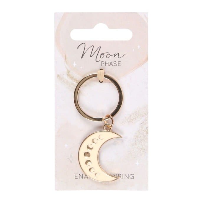 Enameled crescent moon keyring with gold-tone moon phase design on a backing card