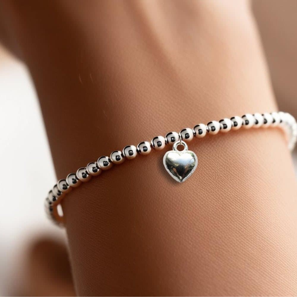 Mum gift box with a silver beaded heart bracelet and red foiled chocolate hearts