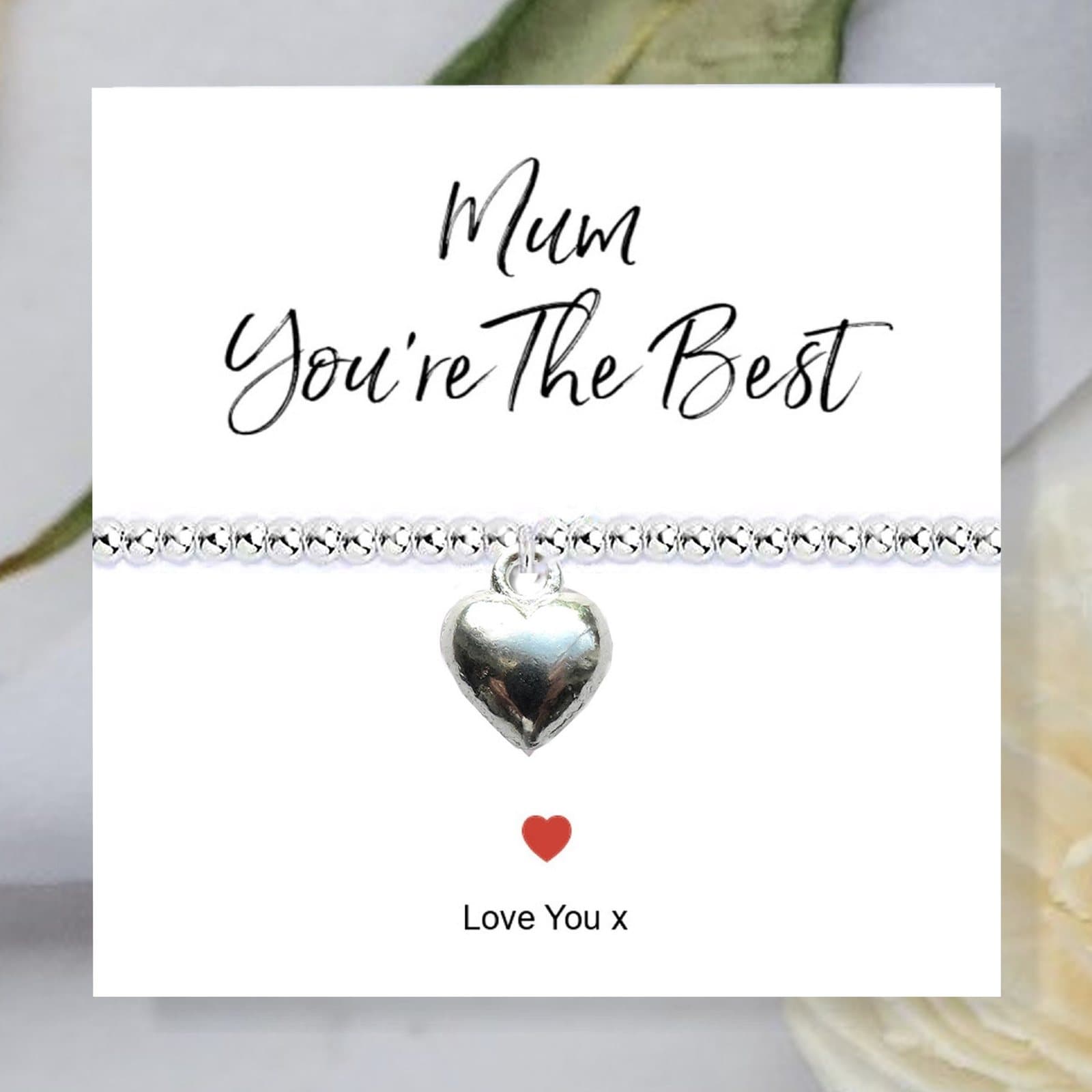 Silver beaded stretch bracelet with a heart charm on a Mum You're The Best message card