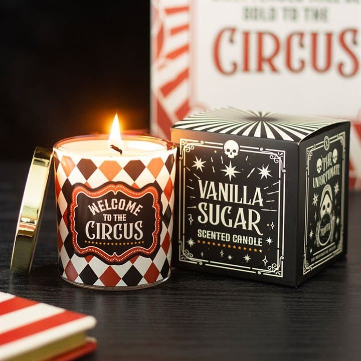 Mystic Circus vanilla sugar candle with harlequin design and Welcome to the Circus label