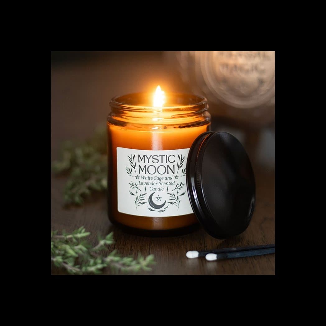 Mystic Moon sage and lavender candle in an amber glass jar
