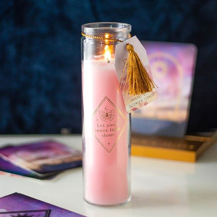 Mystic rose tube candle with rose quartz crystal chips and gold text