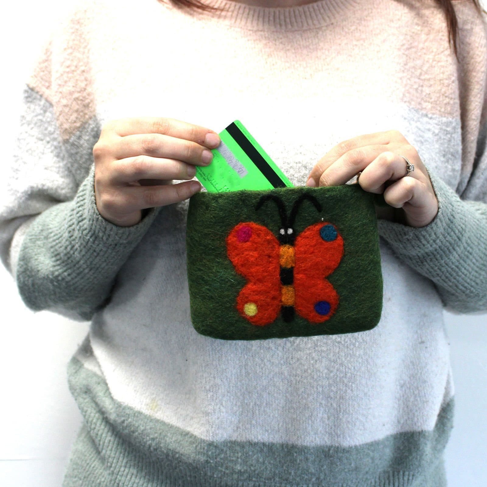 Three felt zipper pouches with butterfly motifs and felt-ball zip pulls