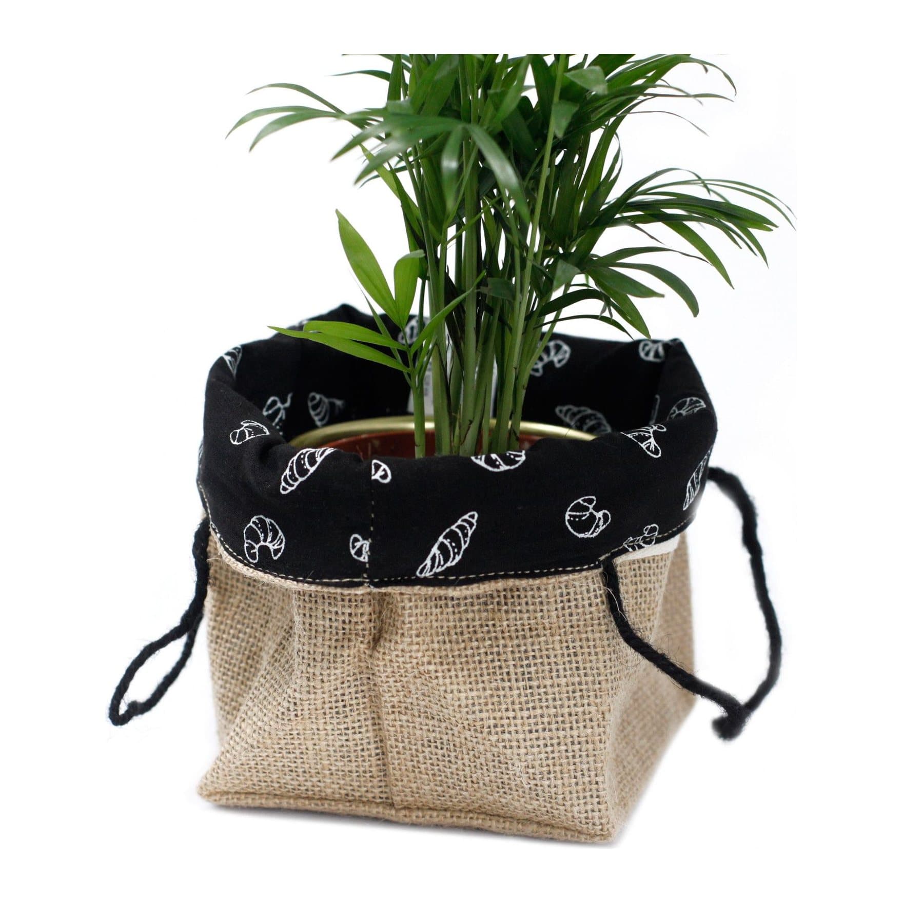 Natural jute gift bag with a black cotton lining and handles