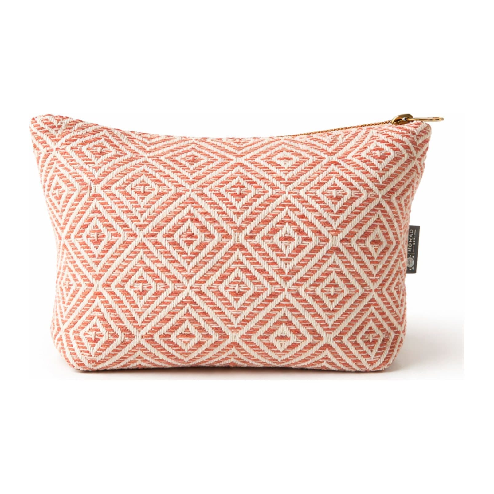 Coral Maze jacquard toiletry bag with a soft coral geometric pattern
